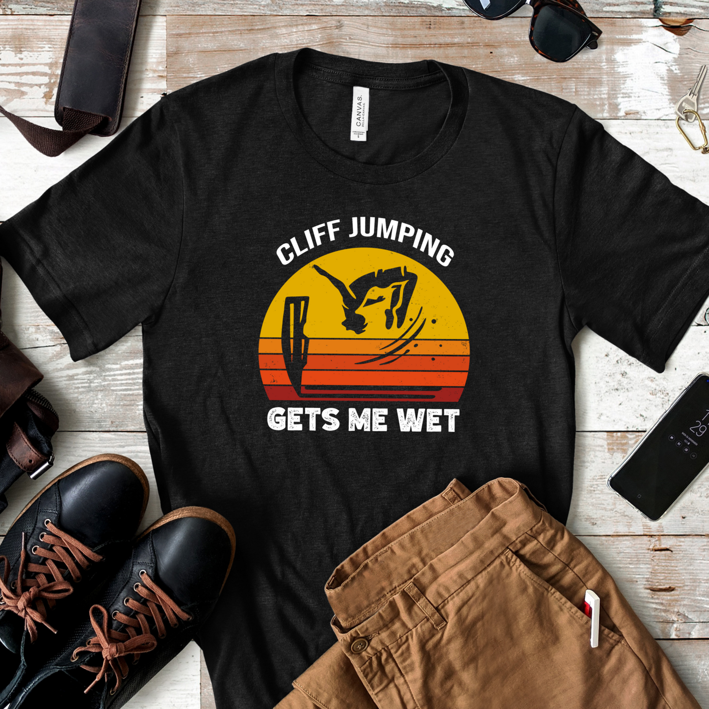 "Cliff Jumping Gets Me Wet" Shirt | Funny Cliff Jumping T-Shirt for Outdoorsy Adventurers - Retro Vintage Sunset Design